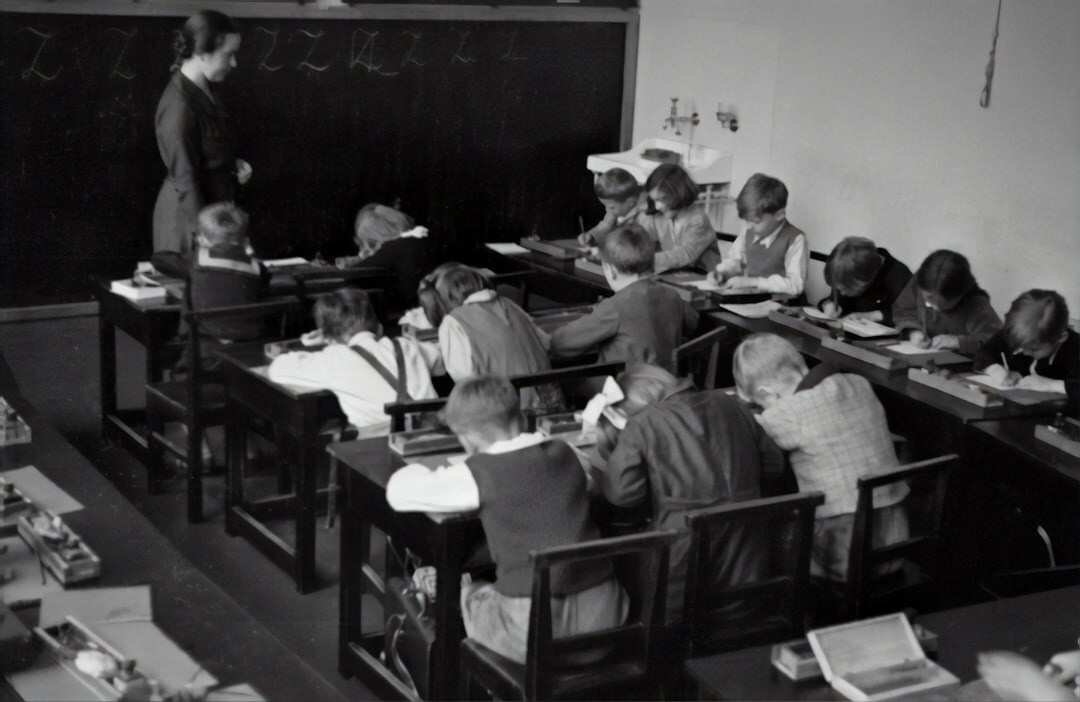 Trainees learning broadcast techniques in a classroom